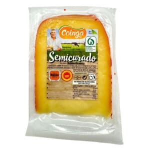 Saftiger spanischer Halbhartkäse, Scheibe, hergestellt aus pasteurisierter Kuhmilch, ideal für Käseplatten oder Sandwiches, mit langjähriger traditioneller Rezeptur.