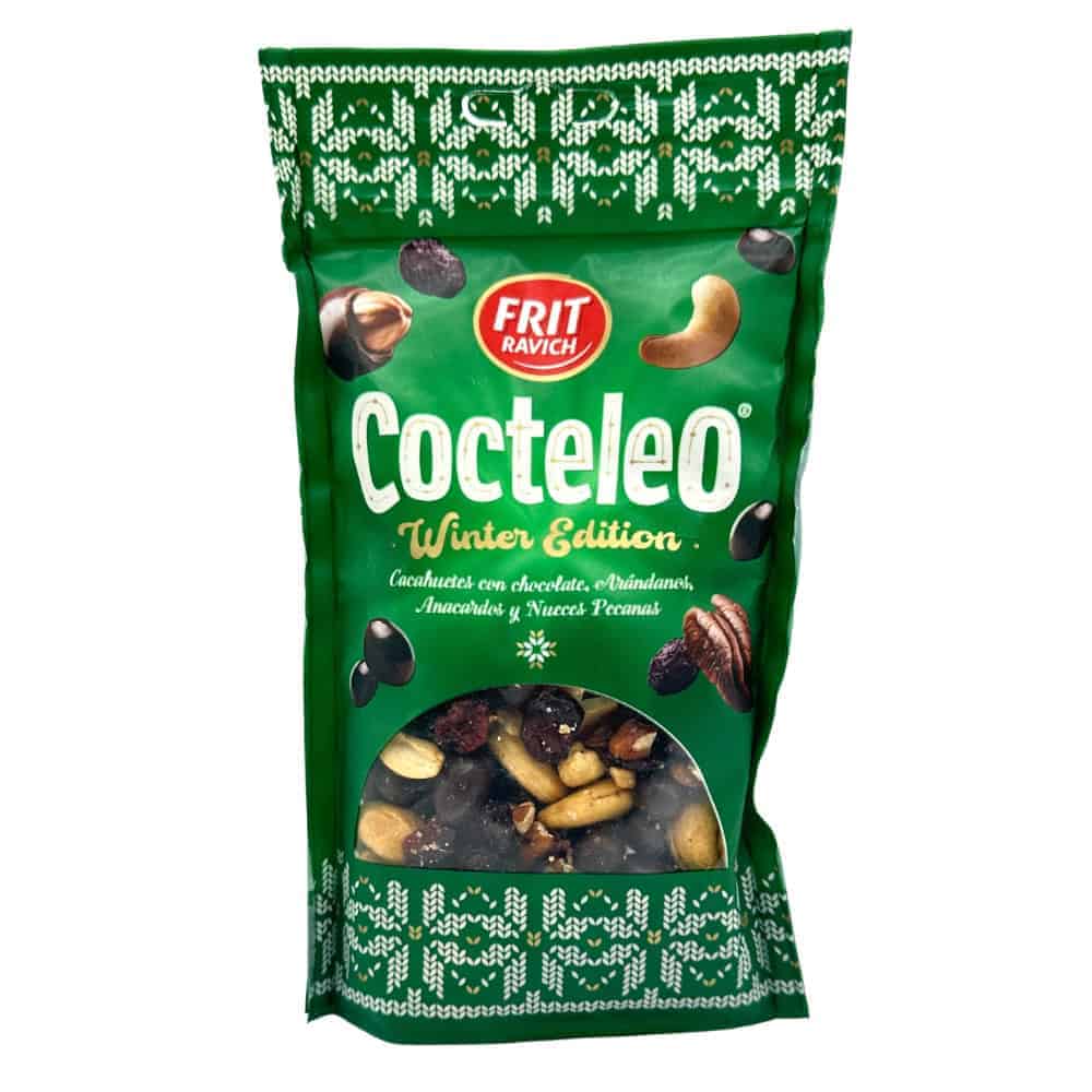 Knabbare Spanische Nussmischung mit Schokolade, Mandeln, Anacardos und Pekannüssen, Sommer Edition, in grüner Verpackung, ideal als winterliches Snack-Highlight.