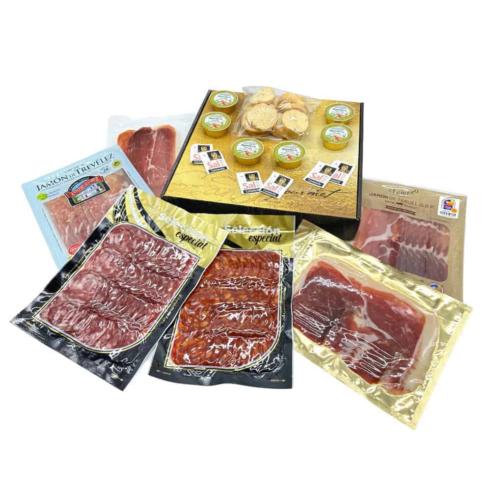 Feines spanisches Wurst- und Fleischsortiment in Vakuumbeuteln und Geschenkbox, ideal für Fleischliebhaber und Feinschmecker.