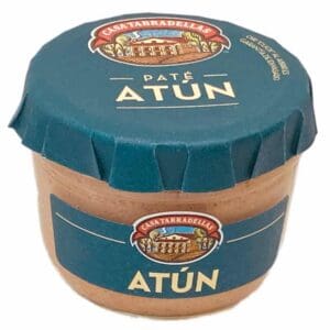 Schalenförmiges Glas mit spanischer Thunfischpaste, verpackt in blauem Deckel, bekannt für hochwertige Meeresfrüchte direkt aus Spanien.
