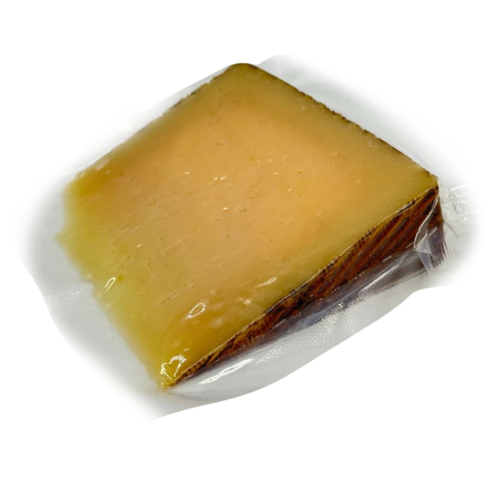 Geriebener spanischer Manchego Käse, vakuumverpackt, hochwertige Qualität, direkt aus Spanien, ideal für Käseplatten und mediterrane Gerichte.