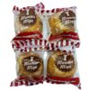 Vier spanische Muffins mit Olivenöl in transparenter Verpackung, Markenlogo "Mamma Miga" sichtbar.