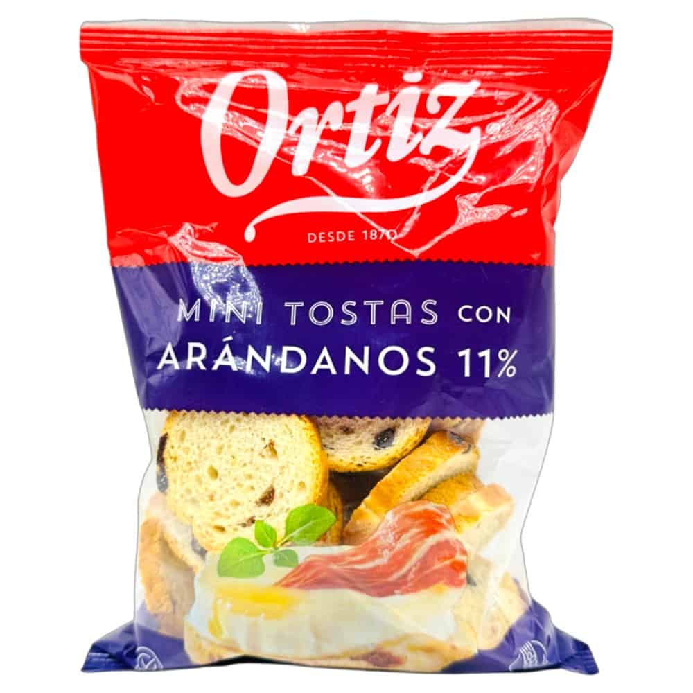 Ortiz Mini Tostas mit Arándanos 11% in roter und blauer Verpackung, ideal für Snacks und Aperitifs.